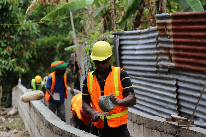 Community members working together in Jamaica